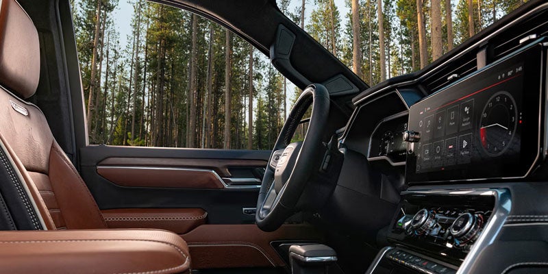2026 GMC Sierra 1500 premium interior featuring advanced safety technologies and a digital driver information display